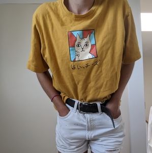 Mustered yellow t-shirt with cat graphic